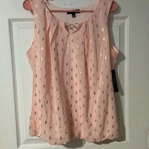 Pink sleeveless blouse bubble hem